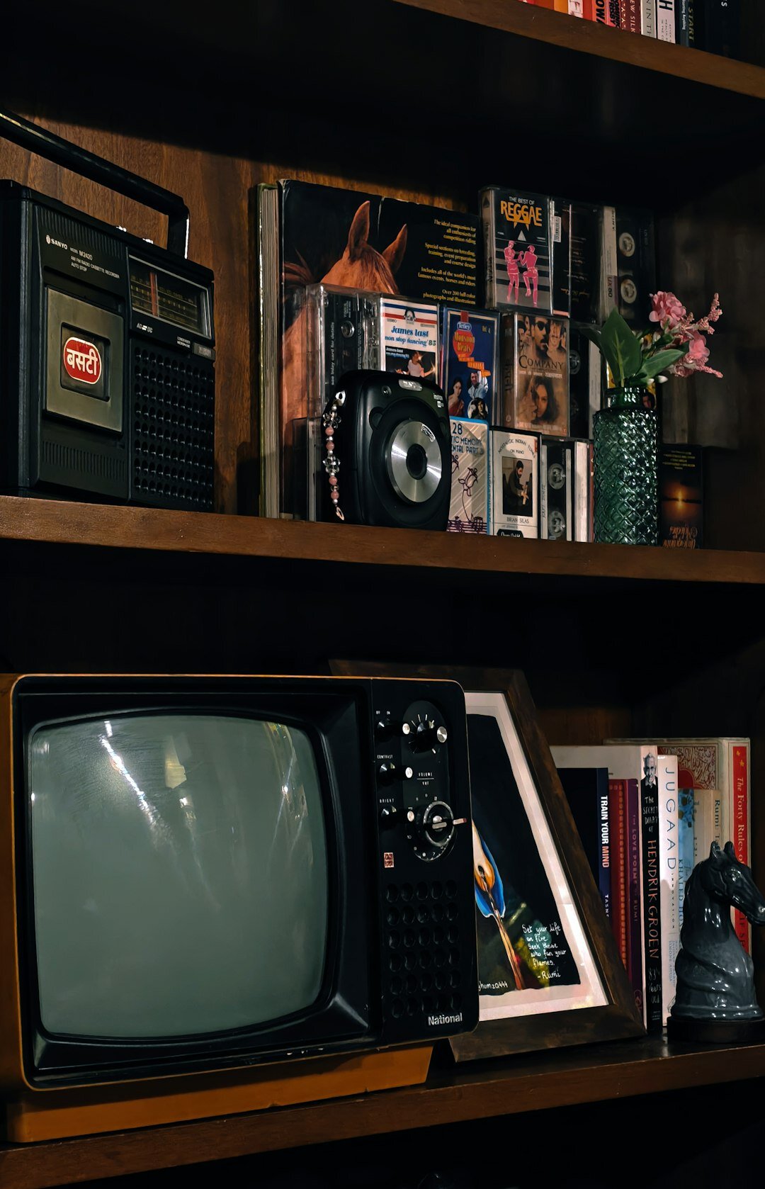 Vintage 1980s television editing suite with monitors and film reels